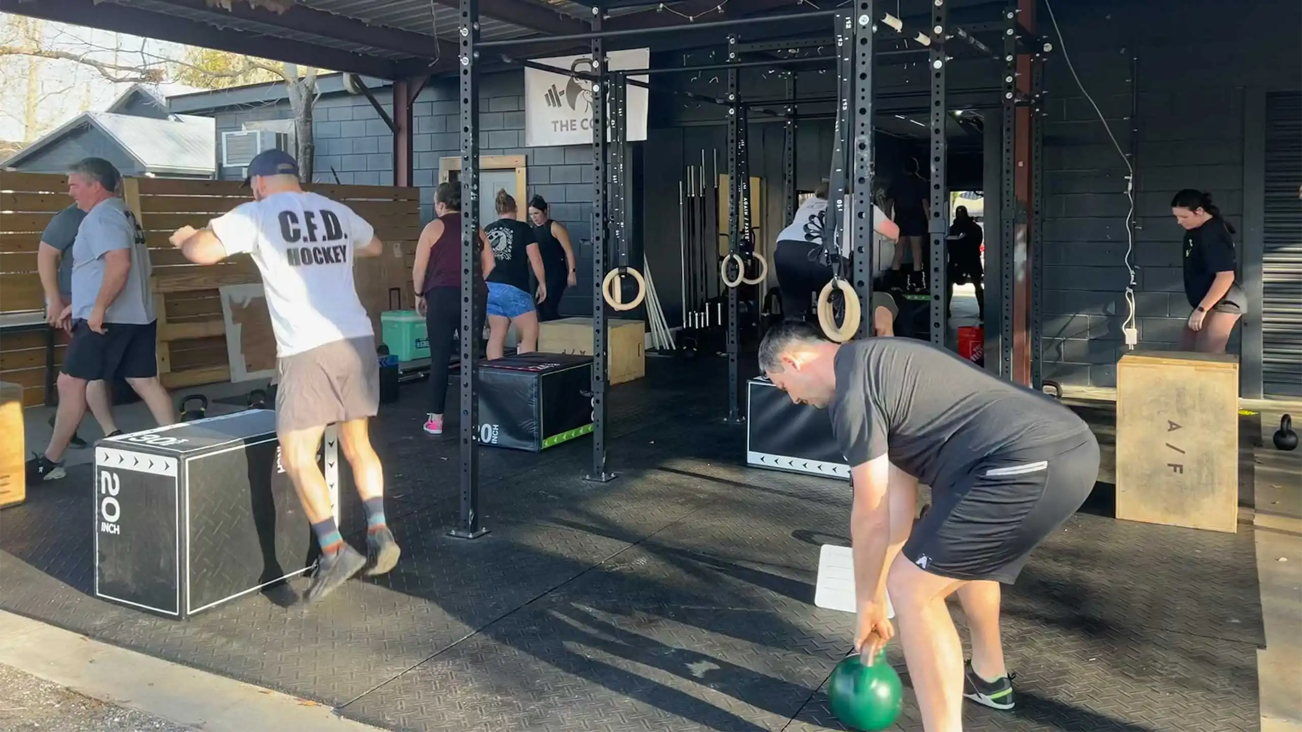 Athletic coach prepares attendees of FREE Savannah Workout at The Coop Gym